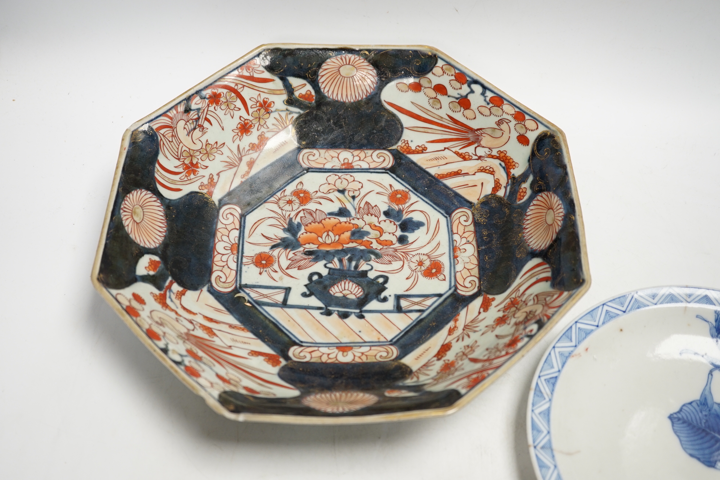 A late 17th/early 18th century Japanese Arita dish (a.f) and two other Arita pieces, largest 27cm